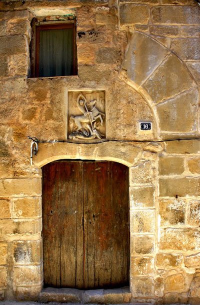 Ancient door, with St George's as protector
